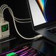 The Shargeek Retro 67 charger connected to several devices using USB-C cables.